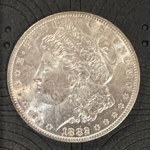 1882-CC Morgan Silver Dollar Carson City Rare US Coin Est MS62–MS63